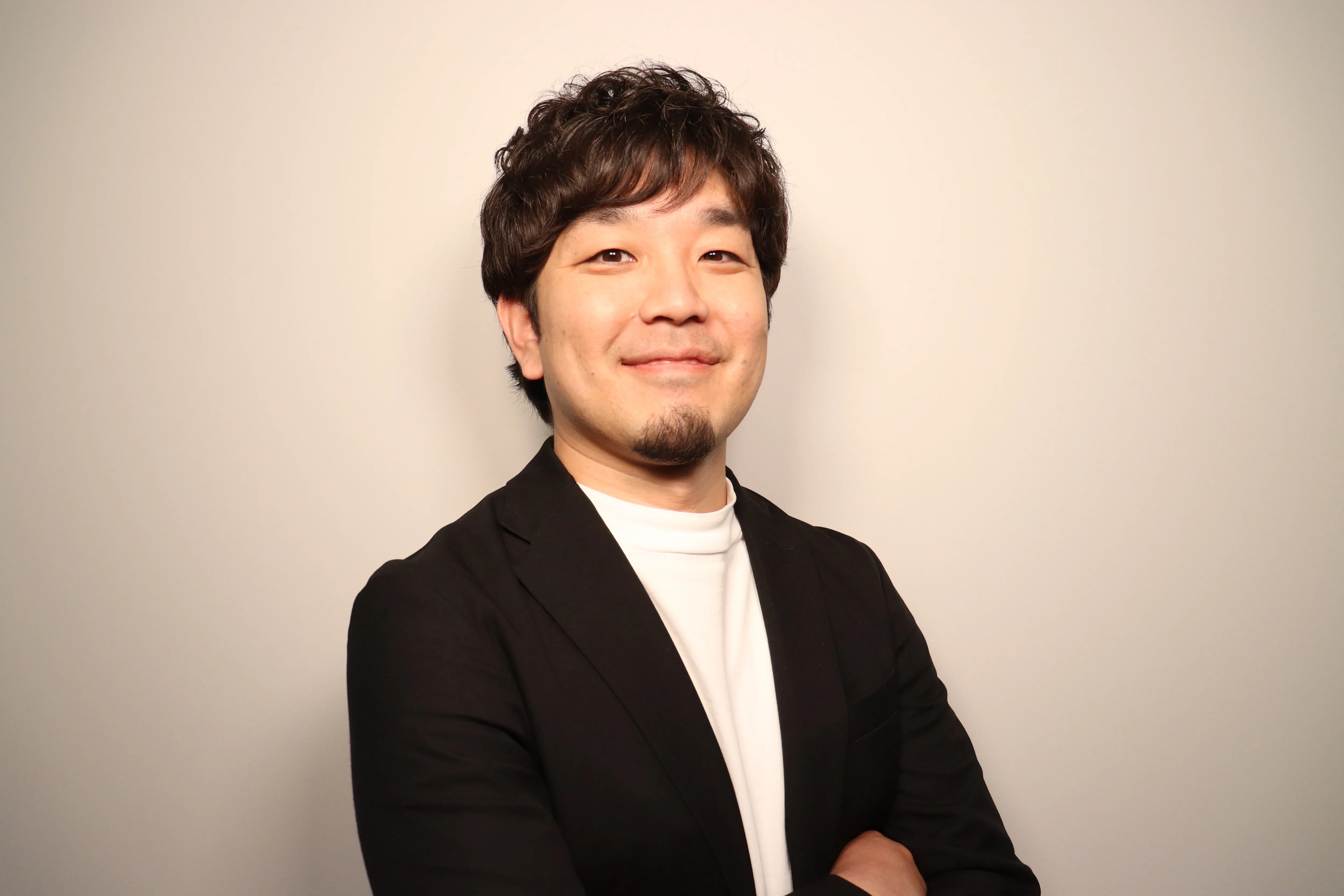 営業部 部長 田中 覚士